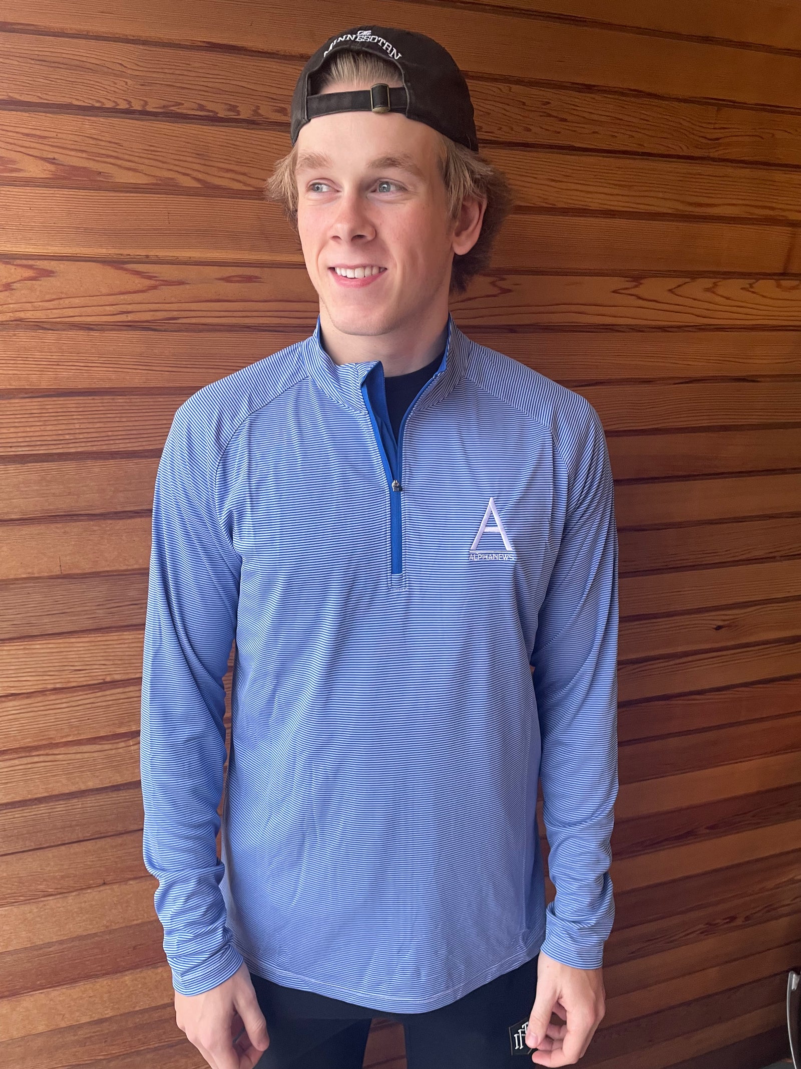 Alpha News quarter zip